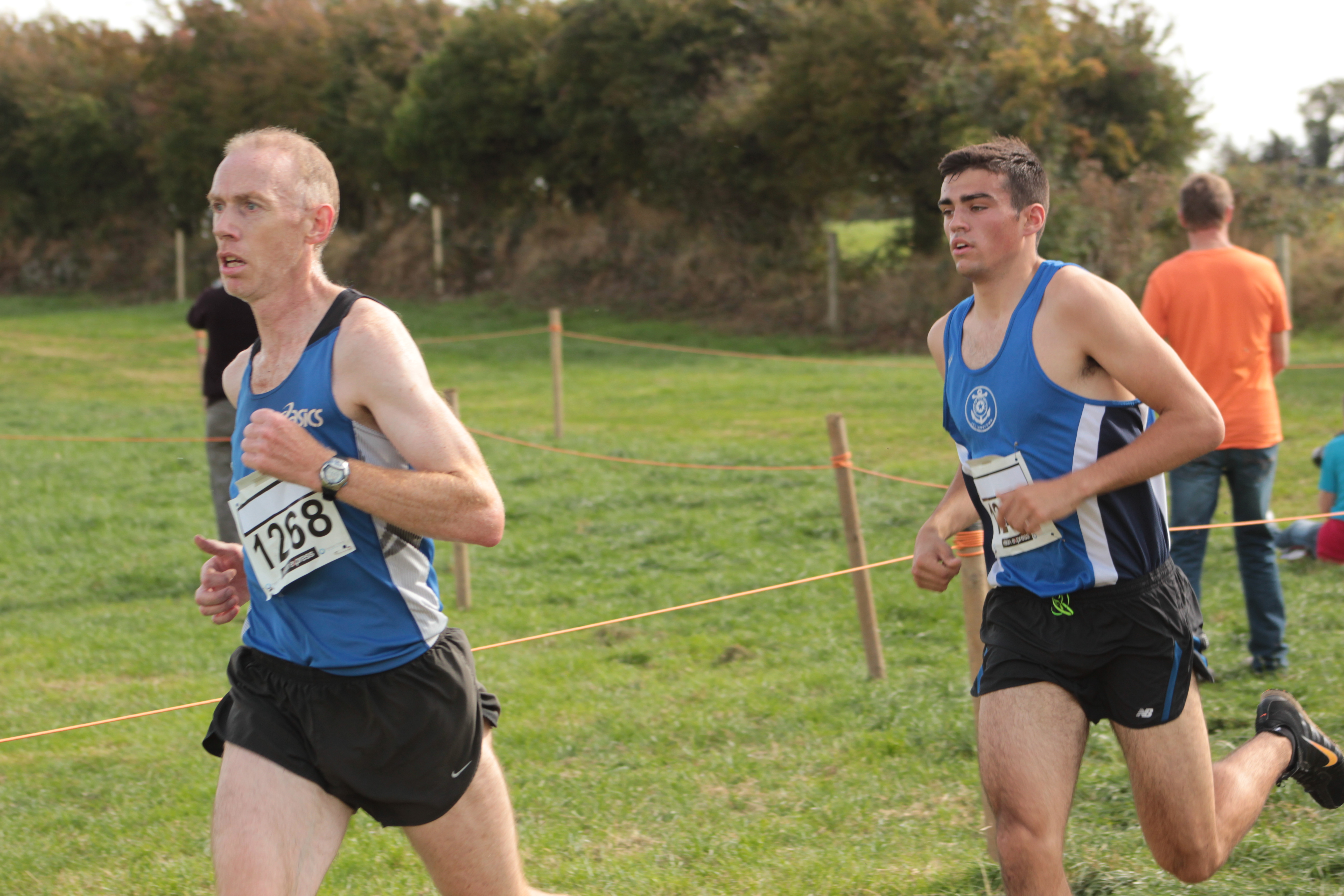 mick-traynor-raheny-leading-andrew-coscoran-star-of-the-sea-on-2nd-lap